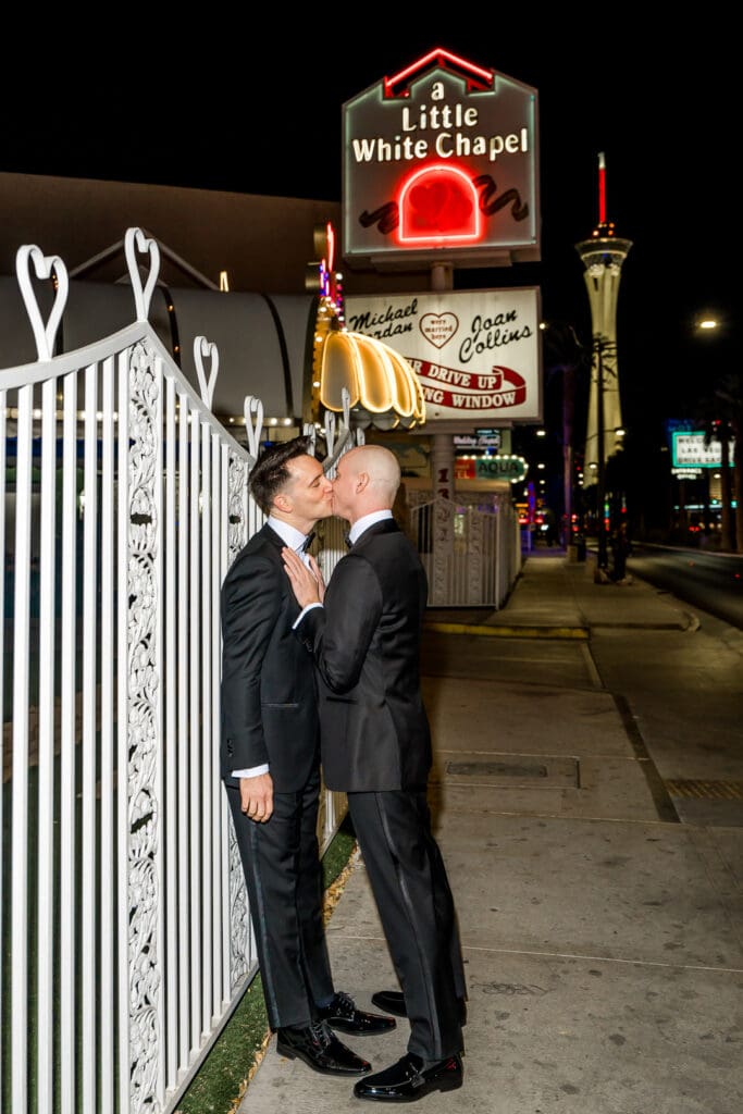 grooms kissing during their bridal portraits