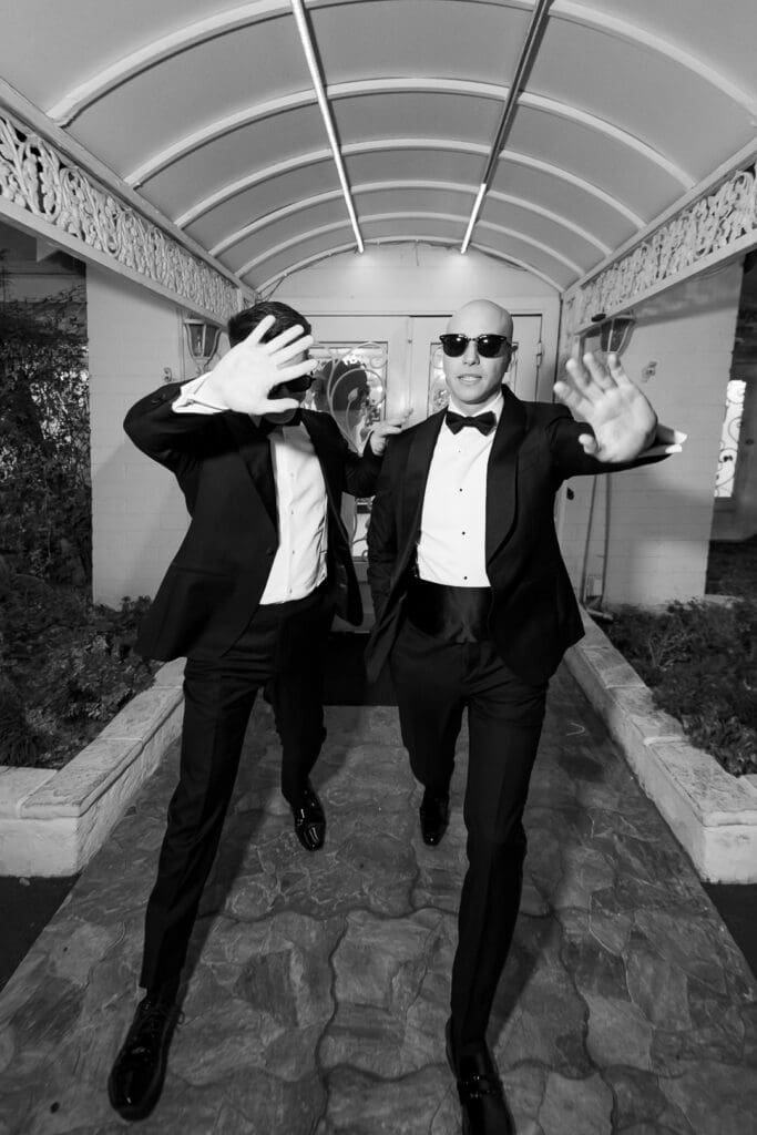 b&w portraits of the grooms at their ceremony 