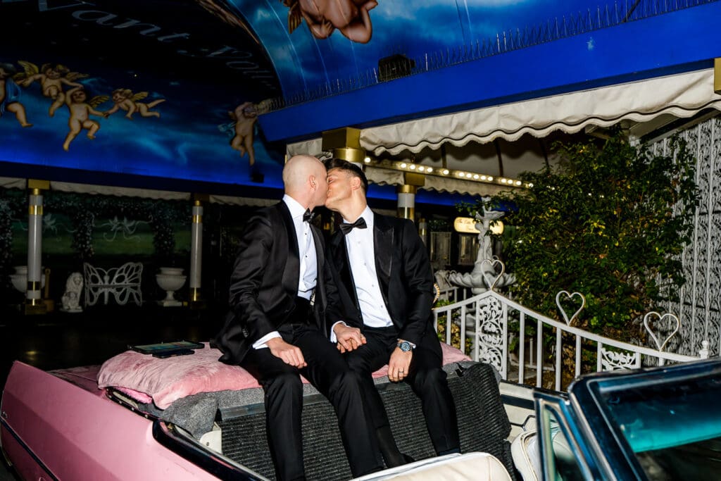 grooms kissing after their ceremony 