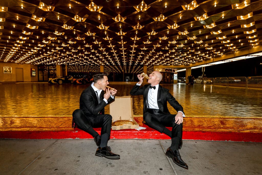 couple at their lad vegas elopement having pizza