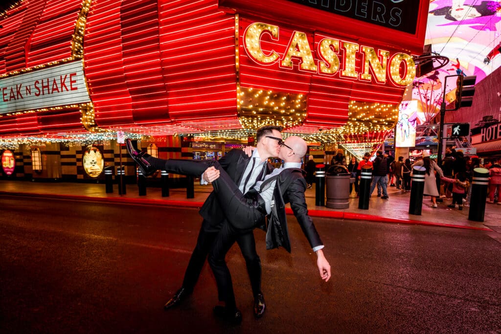 grooms kissing during their bridal portraits