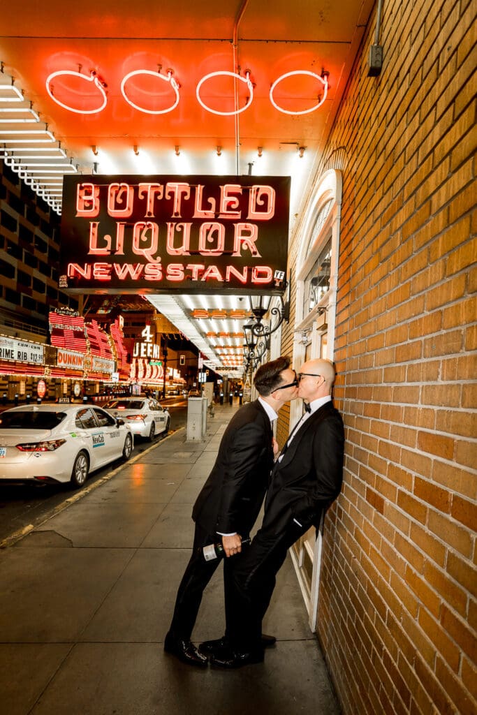 cute picture of the grooms kissing during their photoshoot