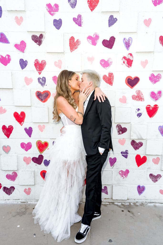 brides kissing during their photoshoot