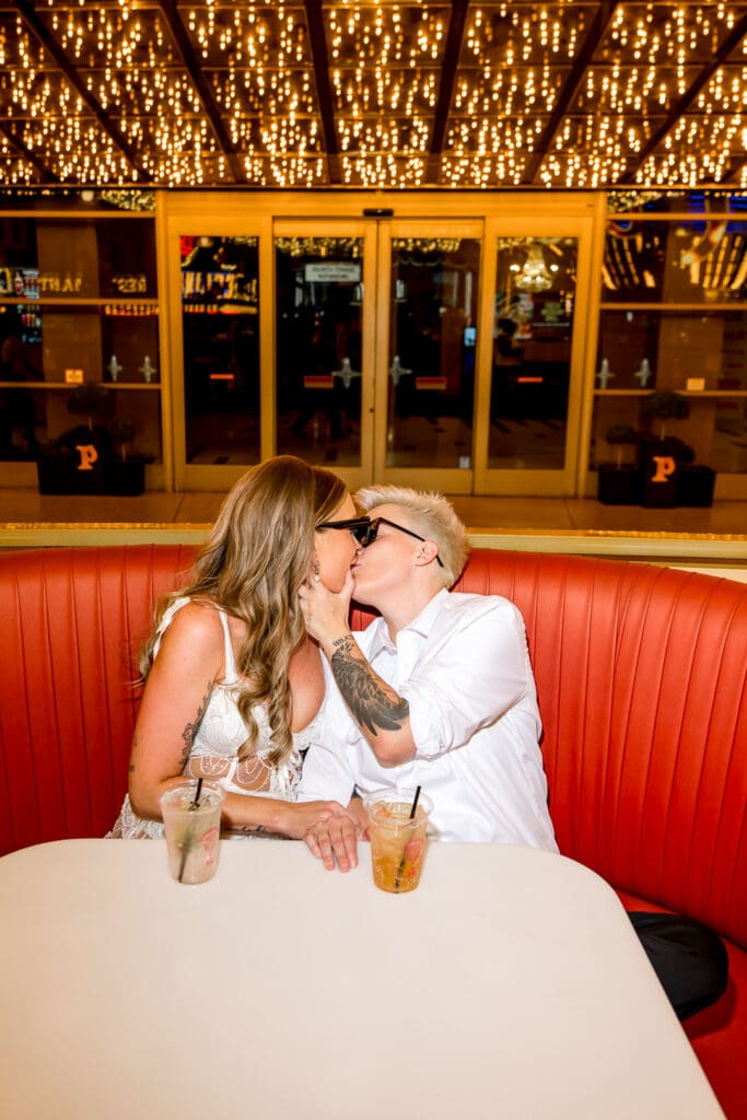 portraits of the brides kissing in DTLV