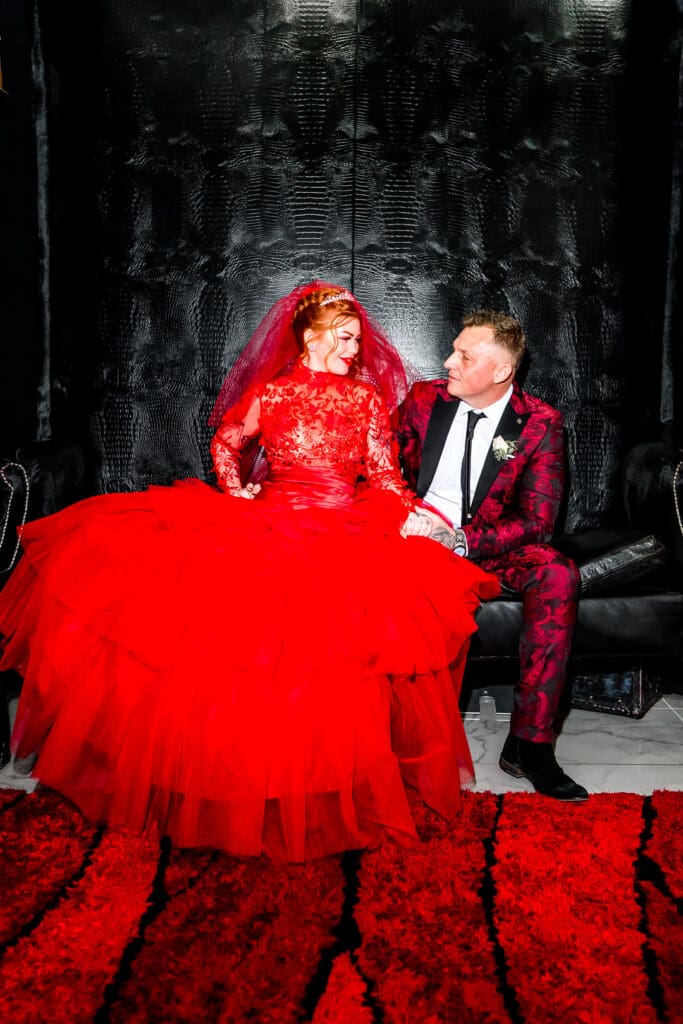 cute and fun picture of the bride and groom laughing with each other 