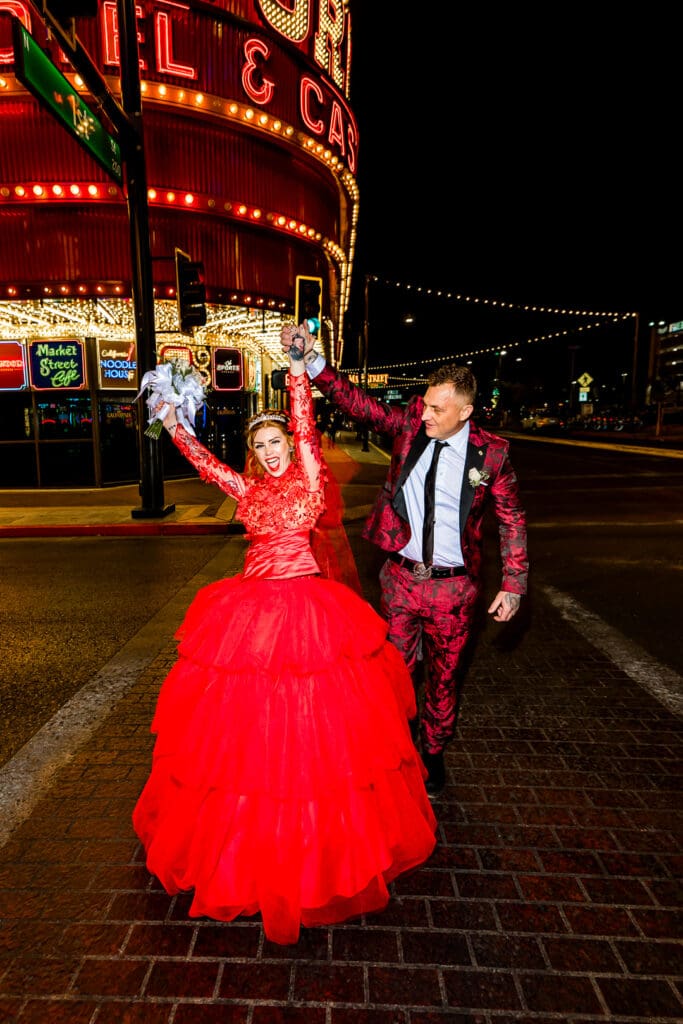 newlyweds happy walking around fremont street