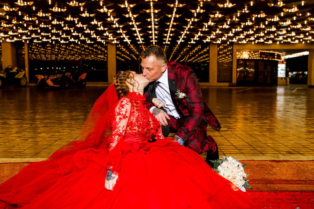 portrait of the newlyweds kissing in DTLV