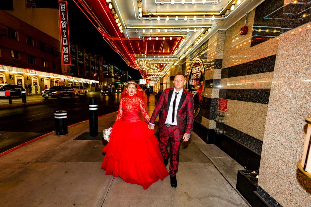 newlyweds having fun in fremont street