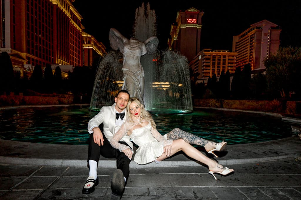 newlyweds posing for the camera during their photoshoot
