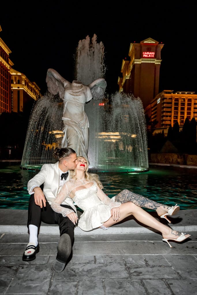 groom kissing the bride on the cheek