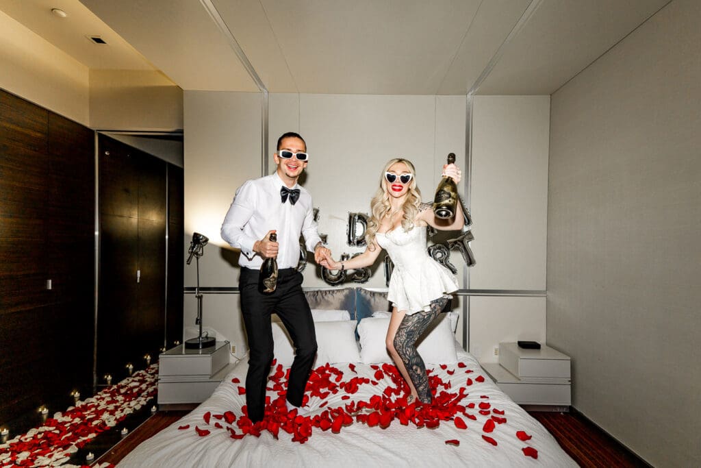 couple celebrating their elopement with champagne
