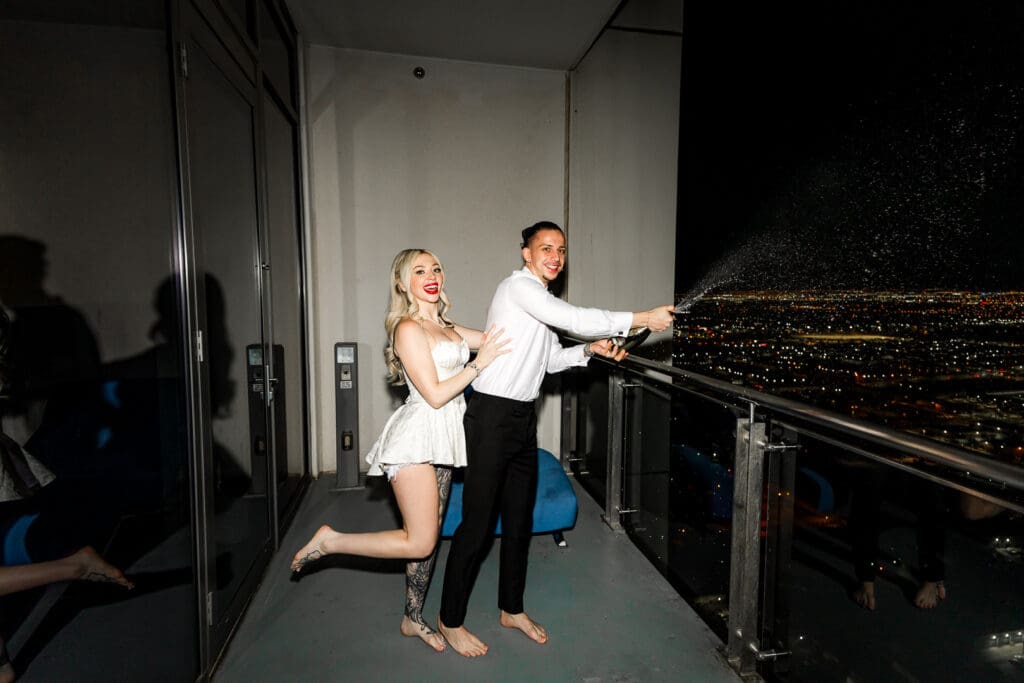 newlyweds celebrating with champagne 