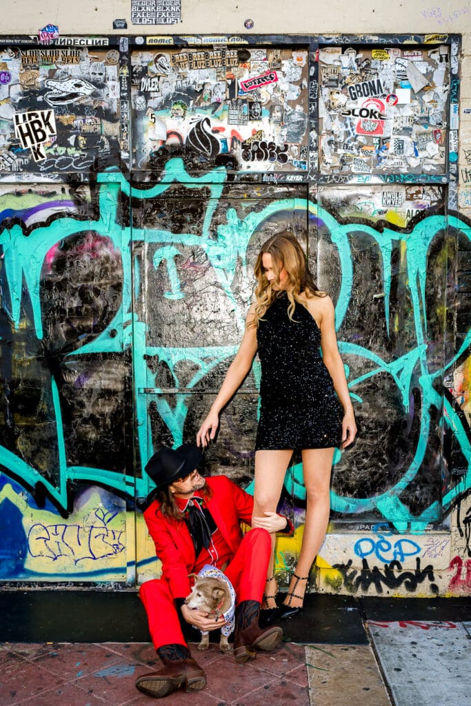 couple laughing with each other during their colorful photoshoot