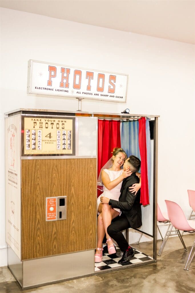 portrait of the bride and groom kissing