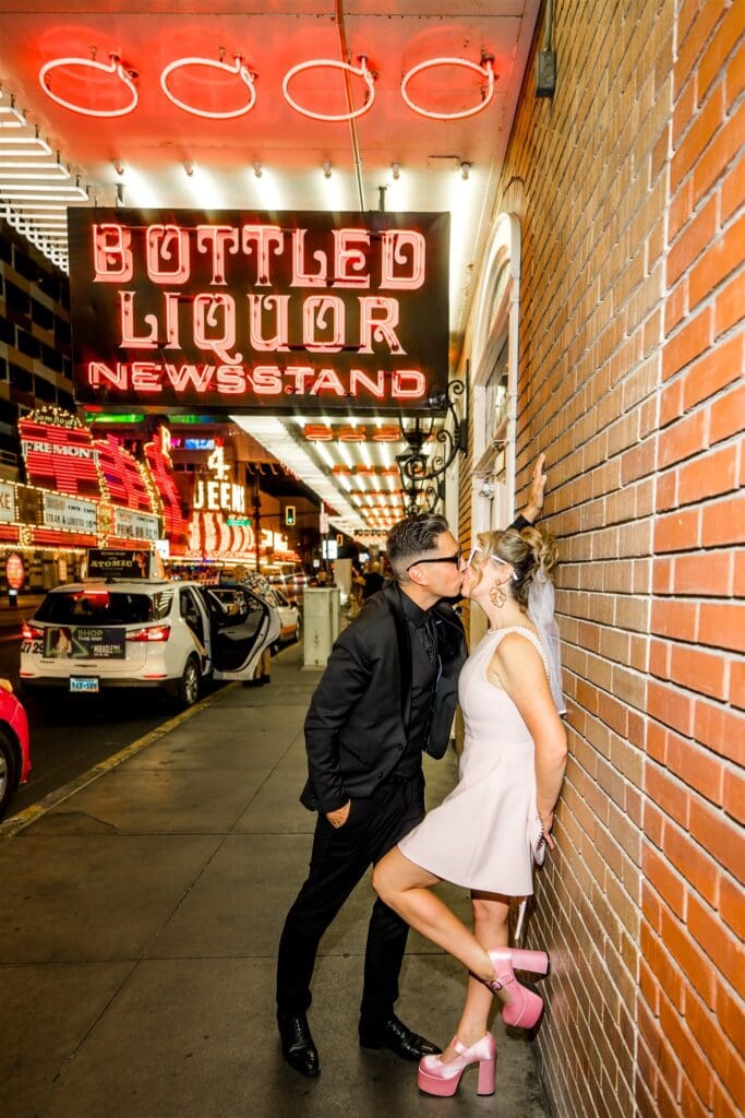 cute picture of the couple kissing during their photoshoot 