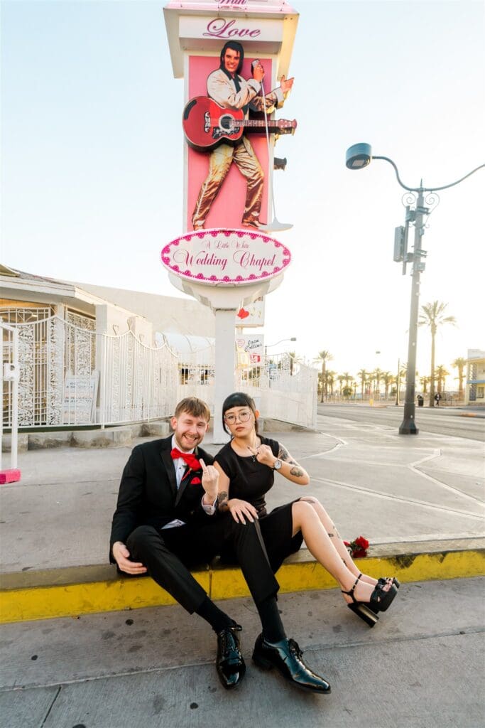 fun picture of the newlyweds showing their wedding rings
