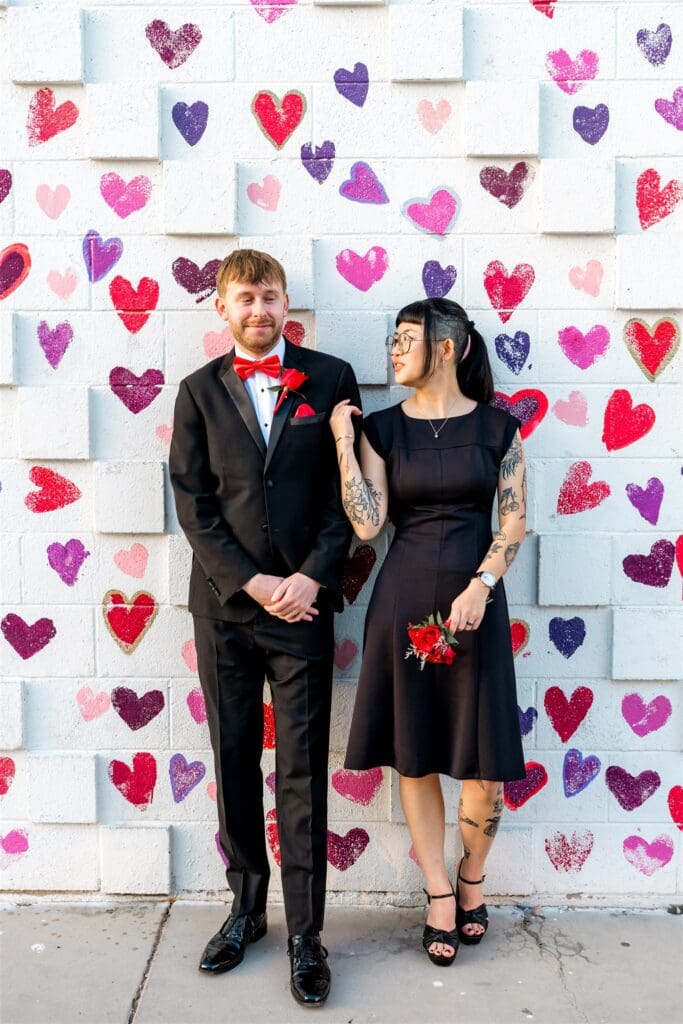 couple looking and laughing at each other 