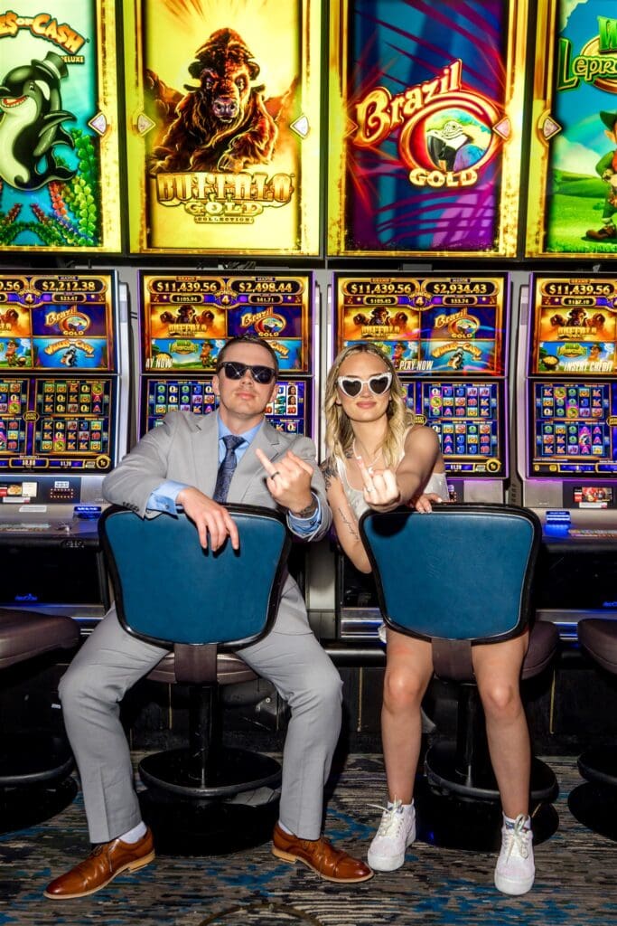fun picture of the newlyweds showing their engagement rings