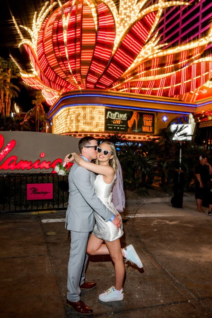 groom kissing the bride on the cheek