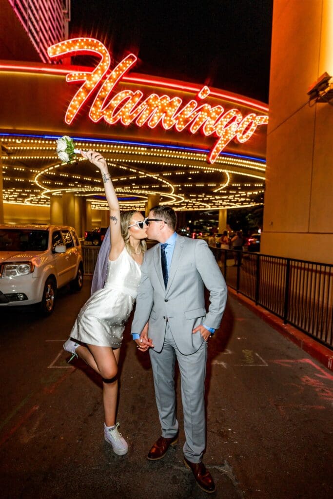 bride kissing the groom on the cheek