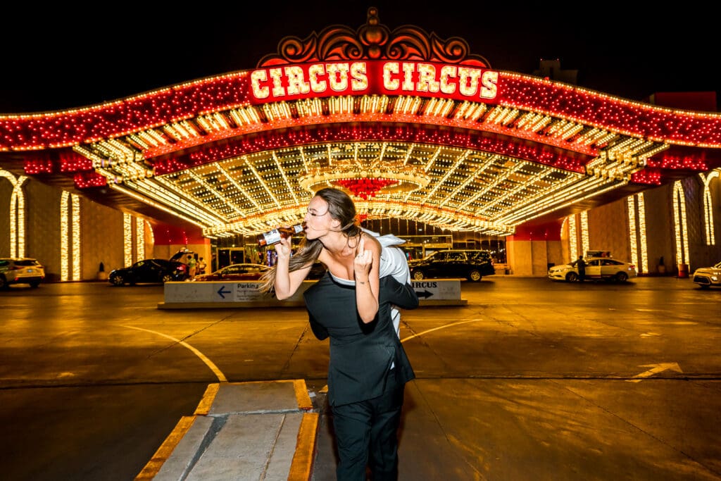 couple celebrating their amazing elopement in downtown fremont street