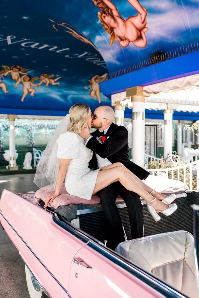picture of the bride and groom kissing at the little white wedding chapel in las vegas