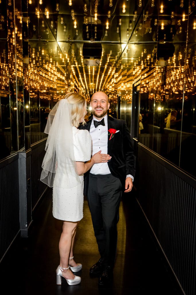 picture of the bride kissing the groom on the cheek