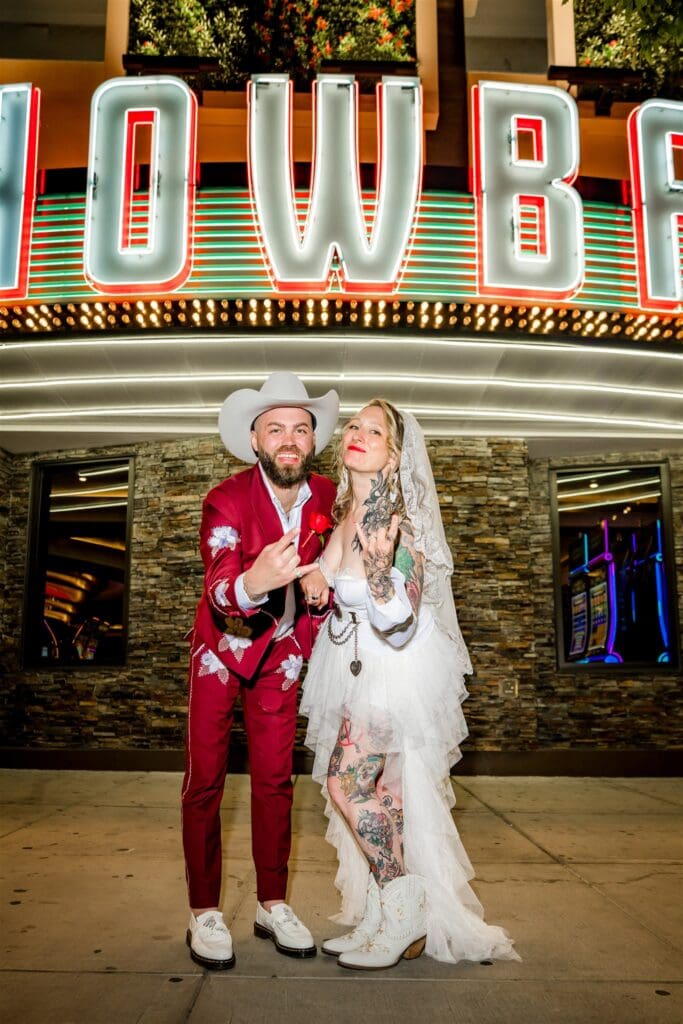 picture of the couple showing their elopement ring