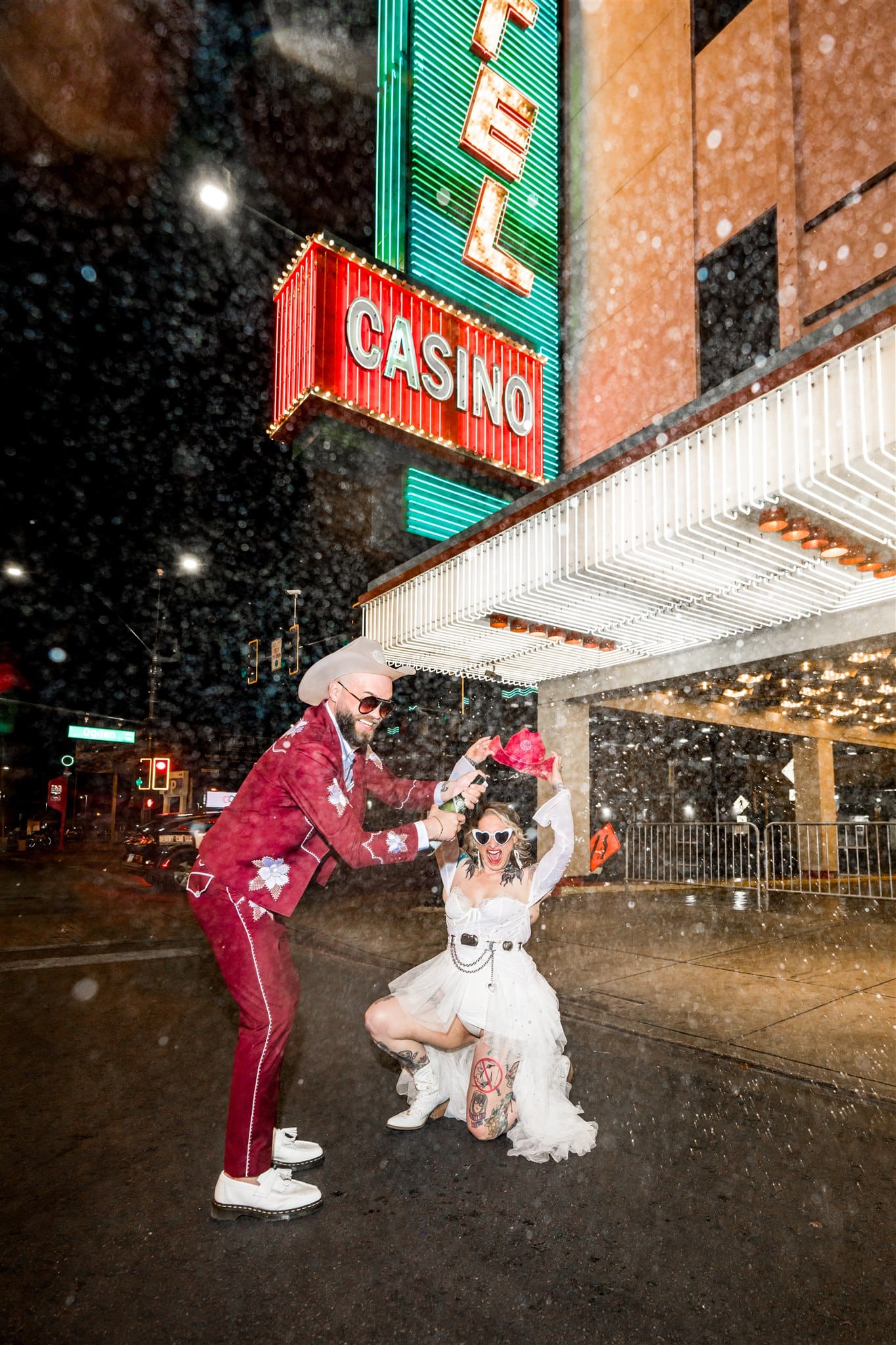 couple celebrating their elopement with champagne