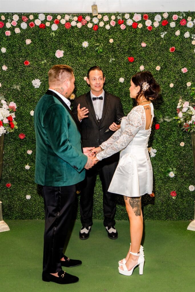bride and groom holding hands during their photoshoot in las vegas