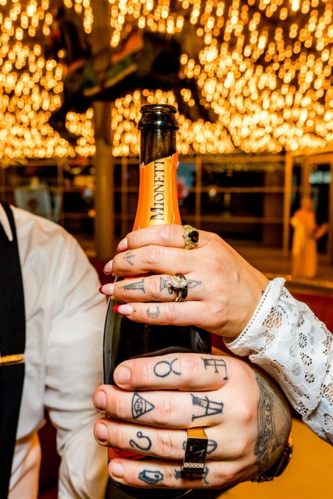 couple celebrating their elopement with champagne