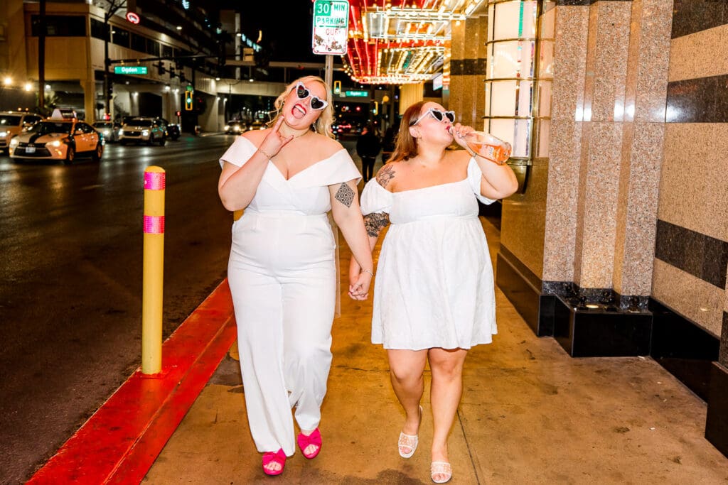 couple walking around fremont street during their session