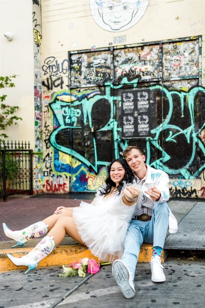 picture of the newlyweds showing their wedding rings
