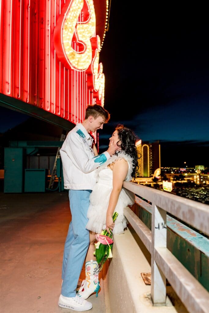 cute couple looking and smiling at each other during their photoshoot