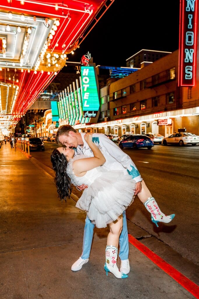 couple kissing in downtown fremont street