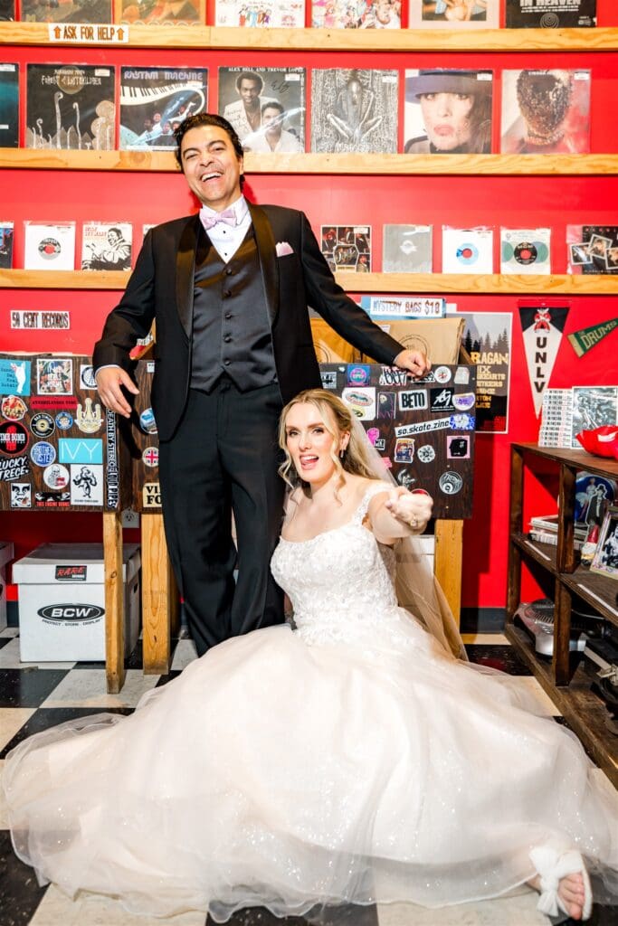 couple smiling at the camera during their photoshoot
