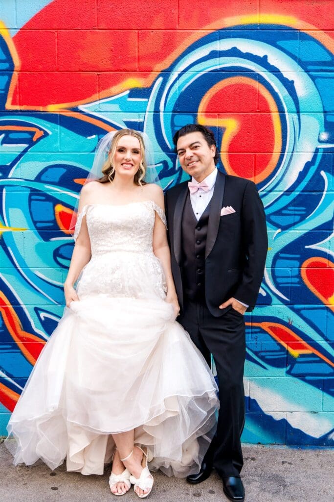 couple smiling at the camera during their session