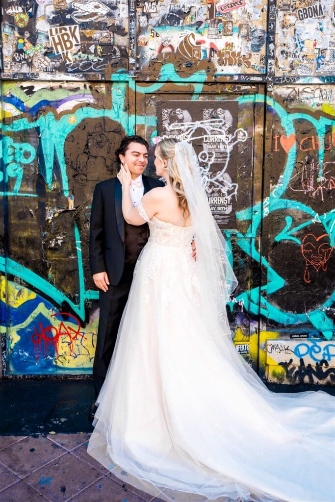 bride kissing the groom on the cheek