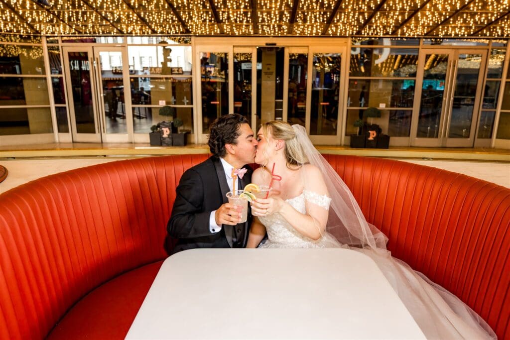 cute couple celebrating their elopement with champagne