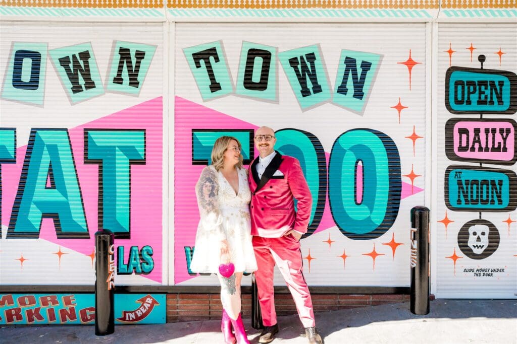 cute picture of the newlyweds walking around sin city