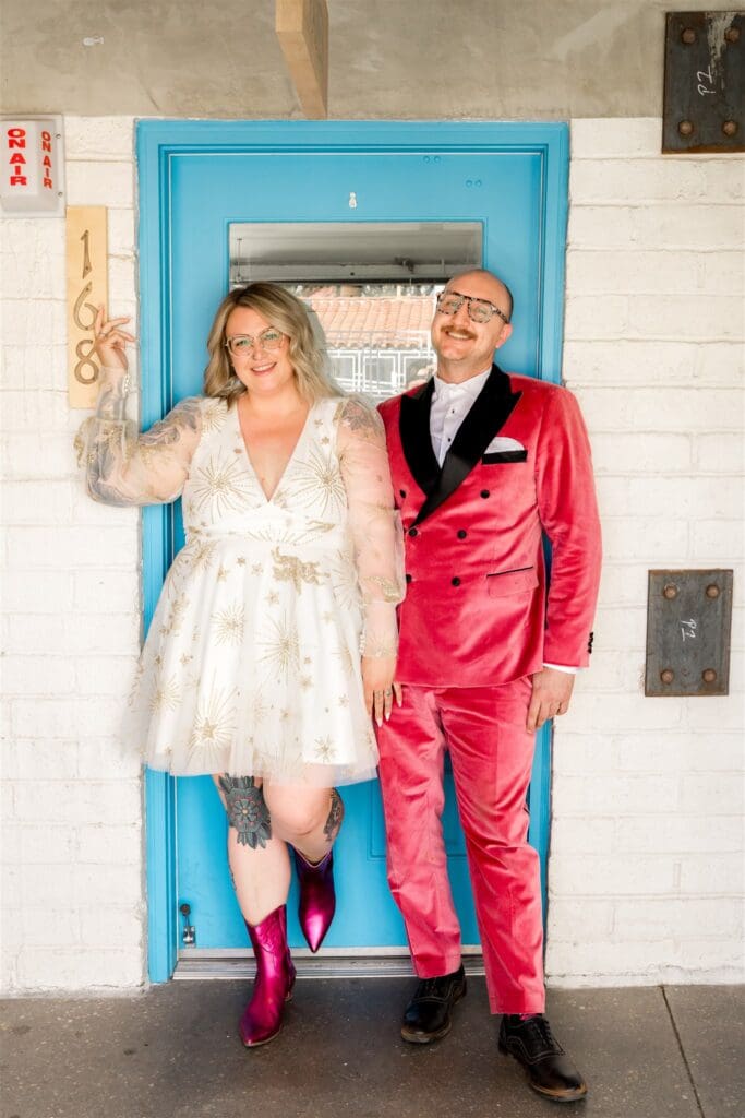 couple smiling at the camera during their bridal session