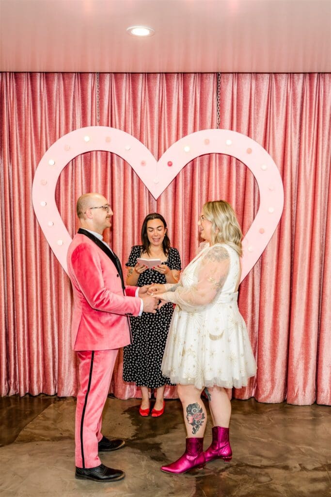 couple holding hands during their ceremony
