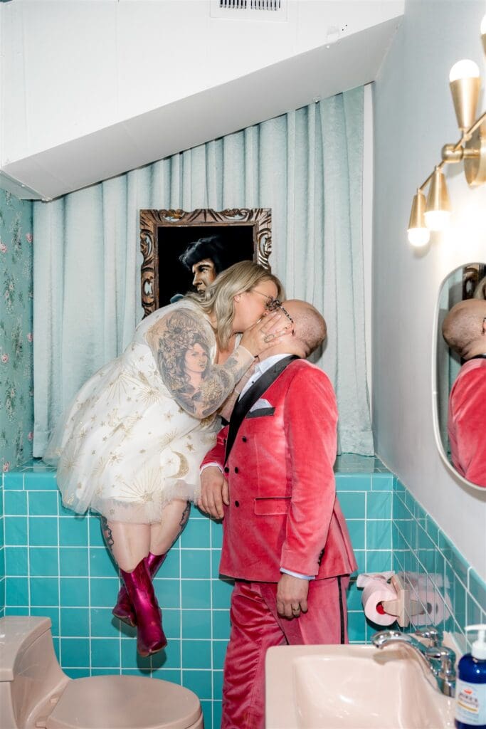 portrait of the newlyweds kissing