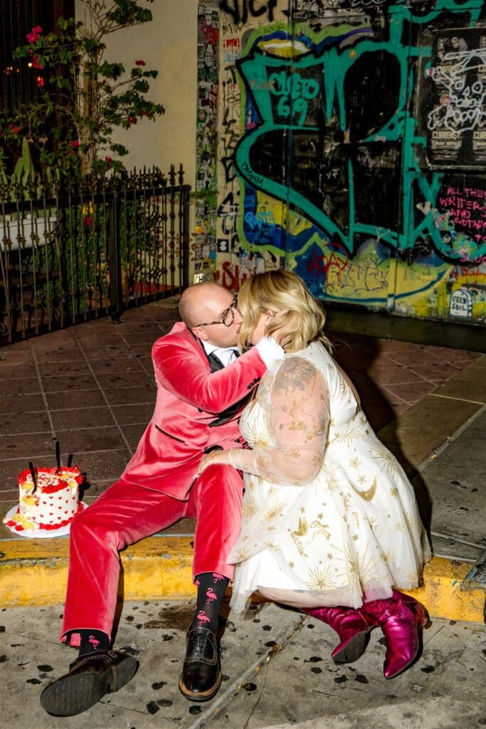 cute picture of the newly married couple kissing during their photoshoot