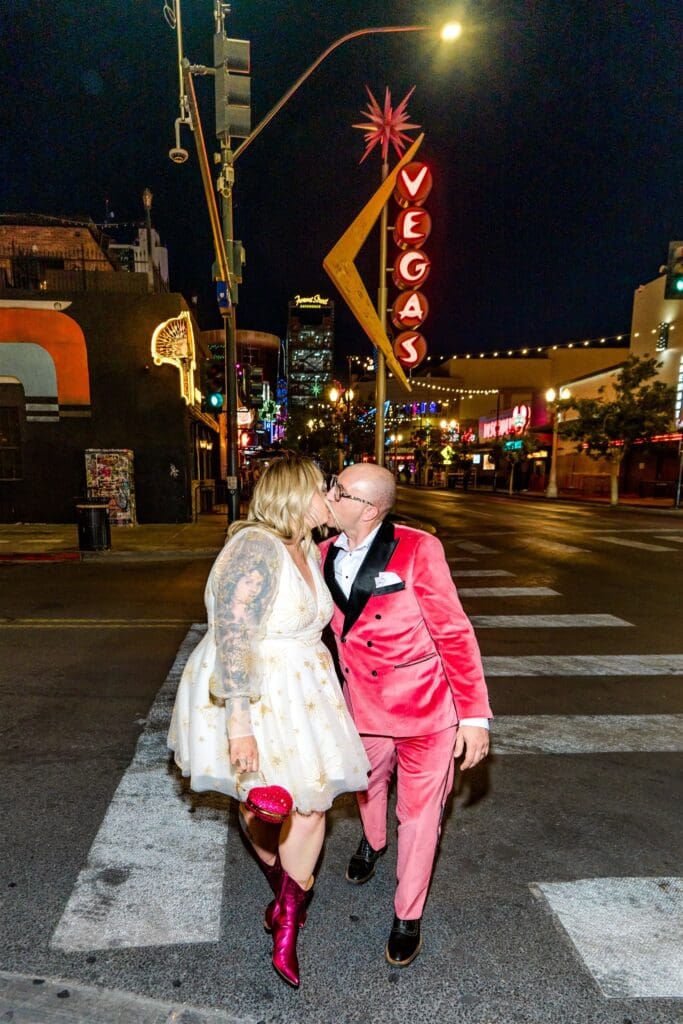 portrait of the newlyweds kissing