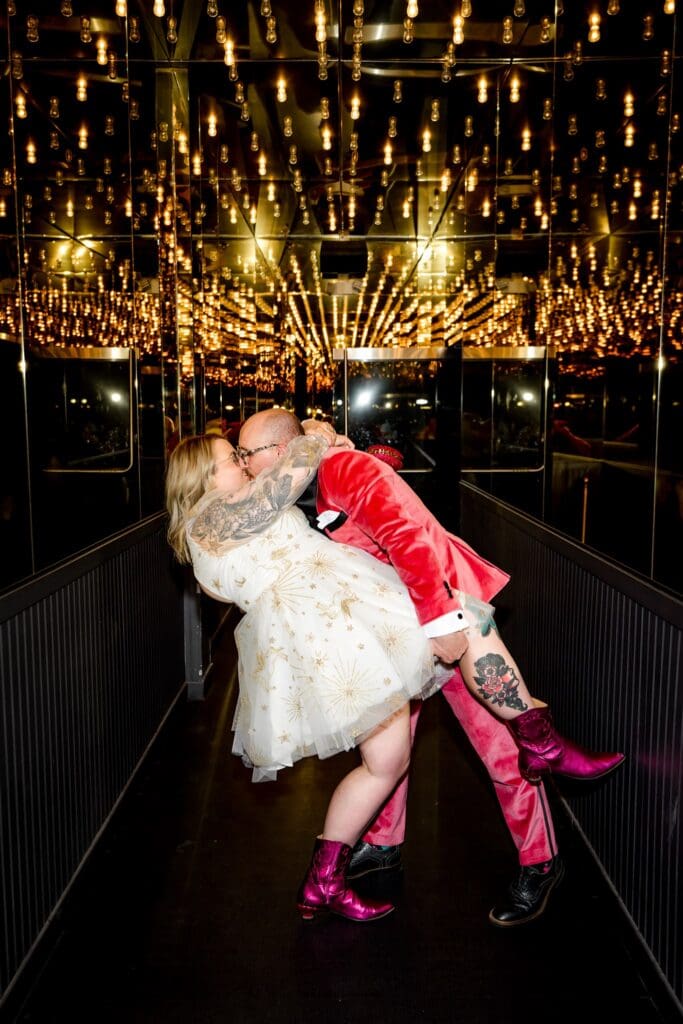 portrait of the newlyweds kissing