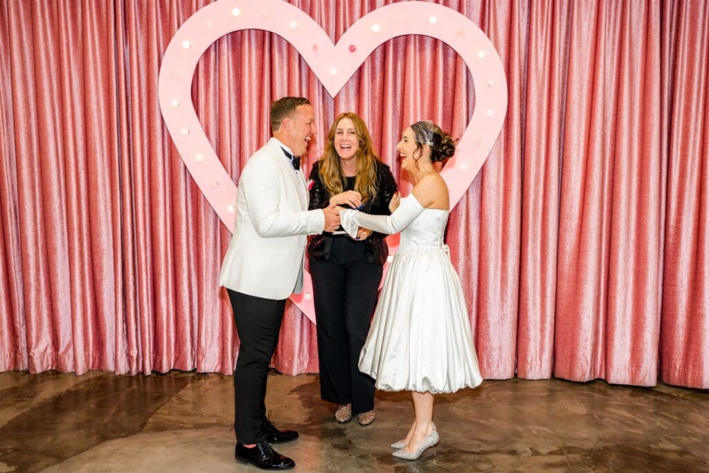 couple having the best time at their las vegas elopement
