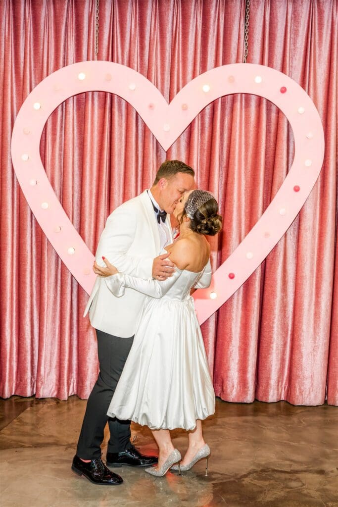 bride and groom kissing after their ceremony