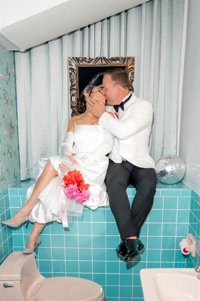 portrait of the newlyweds kissing 