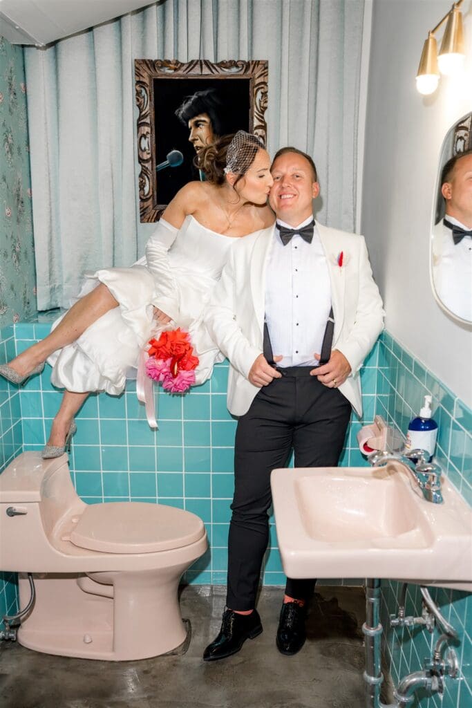 bride kissing the groom on the cheek